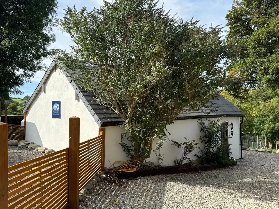 The boarding block, a converted white building with its own gravel yard